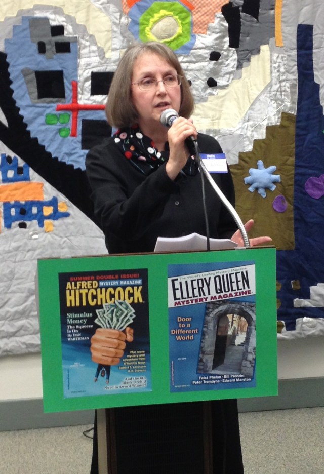 Janet Hutchings, editor of EQMM, presents the 2012 EQMM Readers Awards. (Photo courtesy of Deb Lacy.)