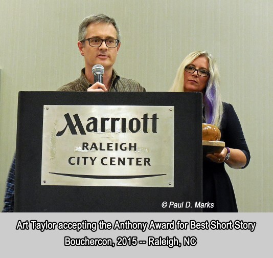 Art Taylor accepting the 2015 Anthony Award for Best Short Story. Photo courtesy of Amy Marks.